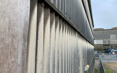 What is asbestos cement and how can you identify it?