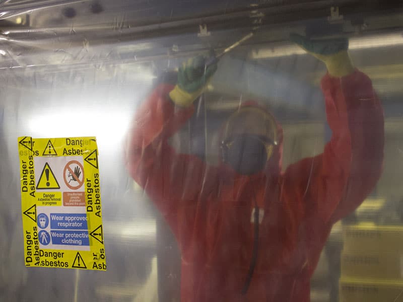 What is the role of negative pressure and air extraction in licensed asbestos removal? 1