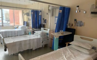 What are the issues and risks when removing asbestos from hospitals?