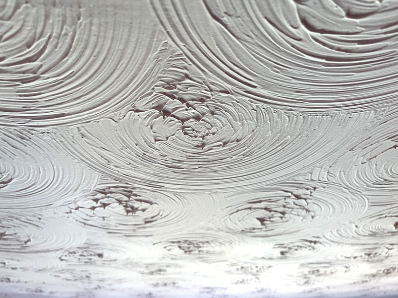 How can you tell if there is asbestos in popcorn ceilings?