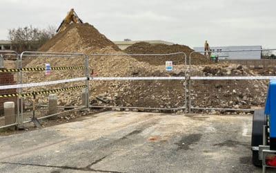 What is CL:AIRE in relation to asbestos-contaminated land?
