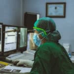 Why is asbestos duty to manage training essential in hospitals and healthcare facilities?