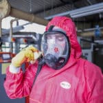 What personal protective equipment should be used for licensed asbestos removal?