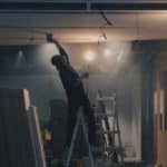 What types of asbestos testing are mandatory during property renovations in the UK?