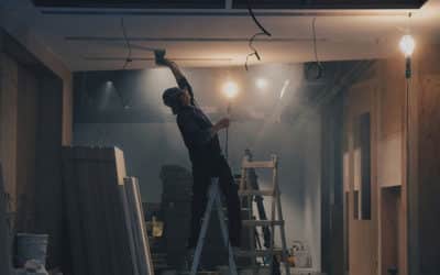 What types of asbestos testing are mandatory during property renovations in the UK?